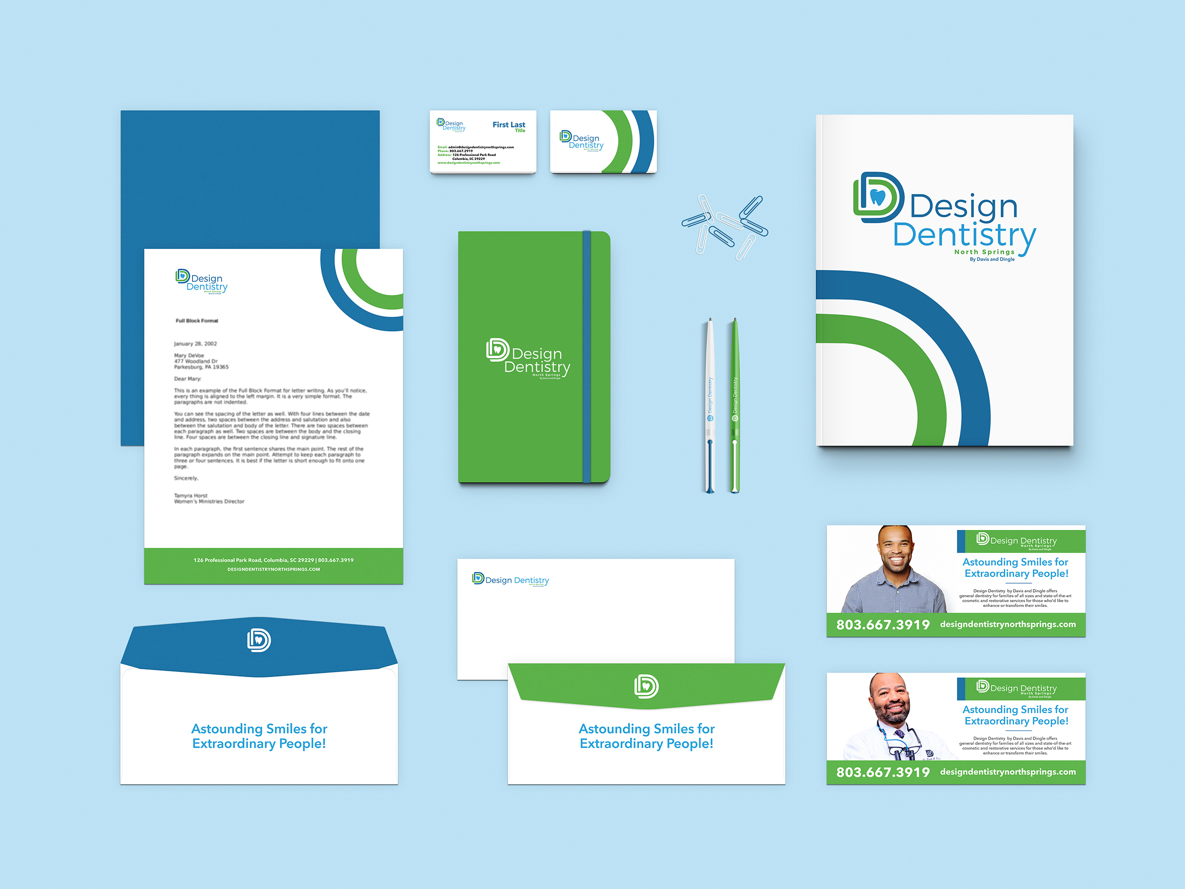 Mockup of Design Dentistry Branded Collateral designed by Streamlined Media & Communications including letterhead, envelopes, business cards, notebook, pens, folder, business card